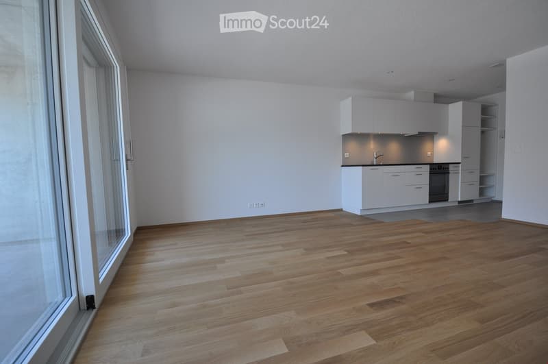 Completely empty room with bare walls and wooden floor. No furniture or equipment.