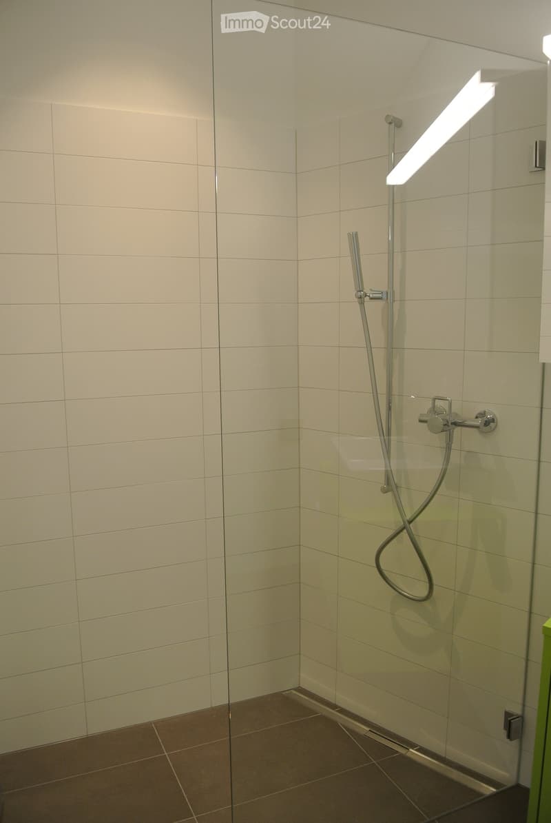 shower, shower head, white tiles, glass wall, shower handle, drain floor
