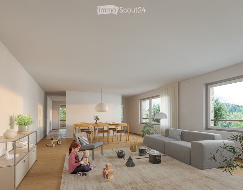 Bright living room with large windows, grey sectional sofa, coffee table, dining area with wooden table and chairs, and decorative plants.