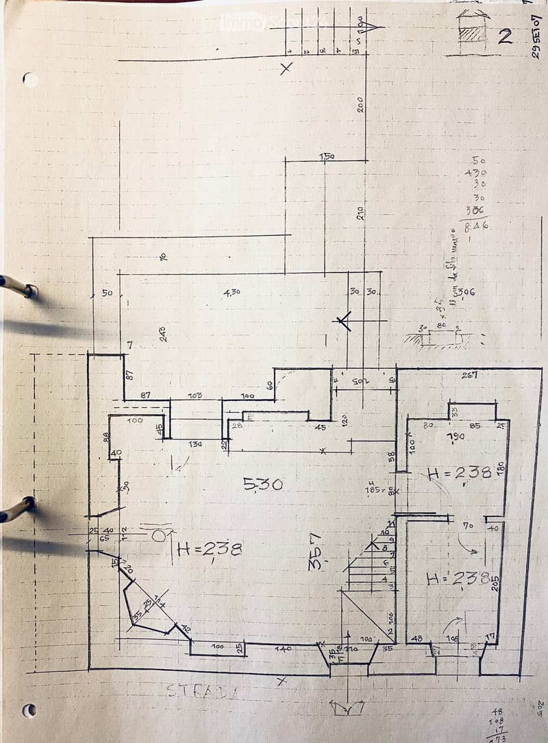 Floor plan with multiple rooms, dimensions, and annotations