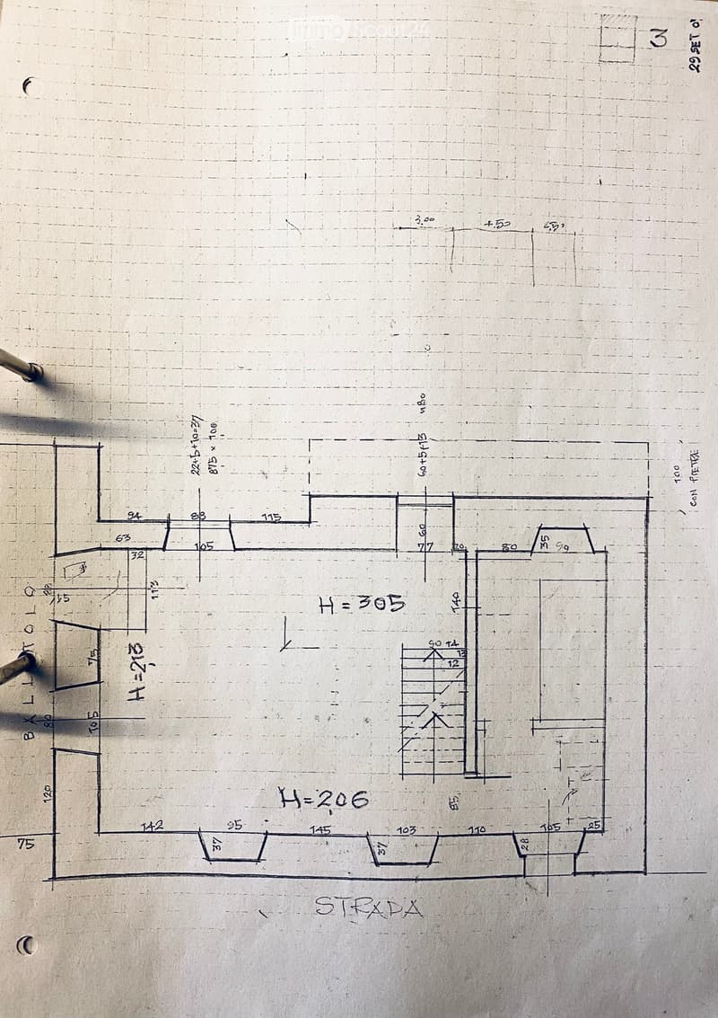 Floor plan with dimensions and measurements, including room sizes and layout.
