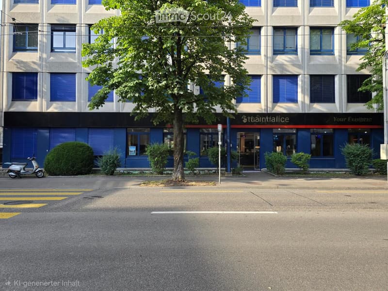 Multi-story building with blue shutters and signage for "Stäntalice" and "Your Exhibits" on the ground floor, surrounded by trees and shrubs, with a scooter parked on the sidewalk.