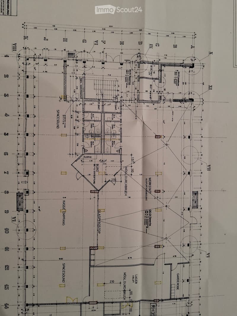 Floor plan of a residential building showing multiple rooms, including living spaces, bedrooms, bathrooms, and utility areas. Dimensions and labels are provided for each room and structural element.