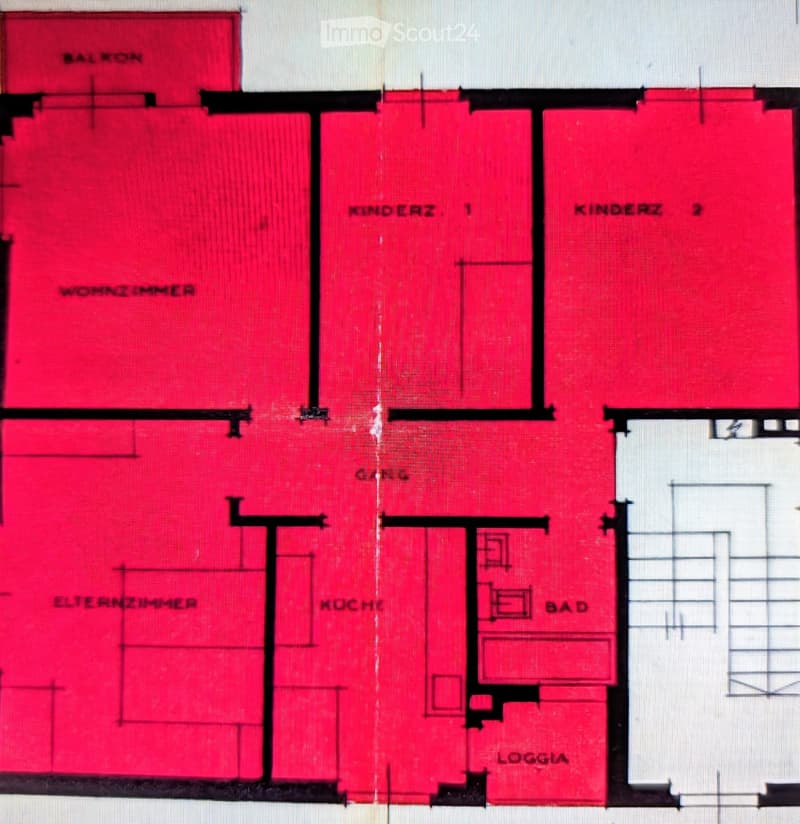 Floor plan showing a living room, kitchen, two bedrooms, bathroom, and balcony.