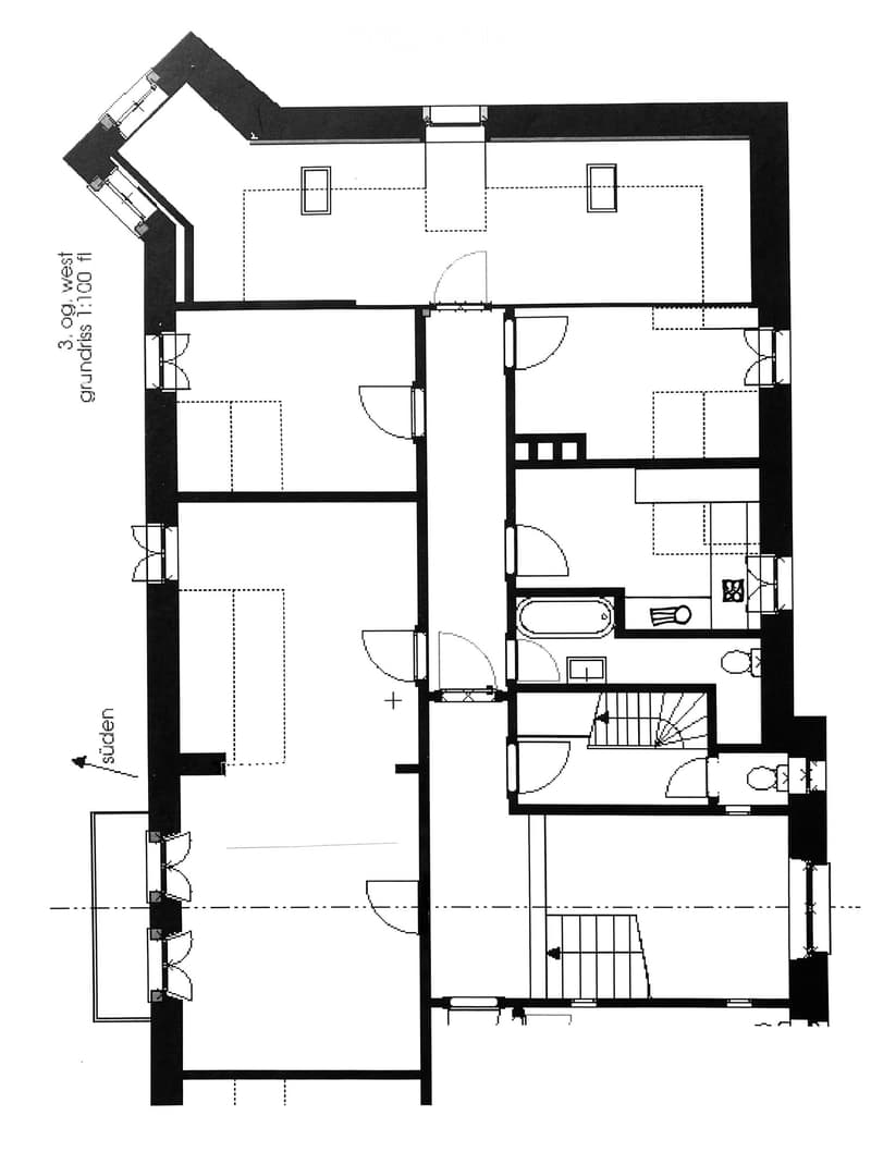 Floor plan of a house with a living room, kitchen, two bedrooms, and a bathroom.