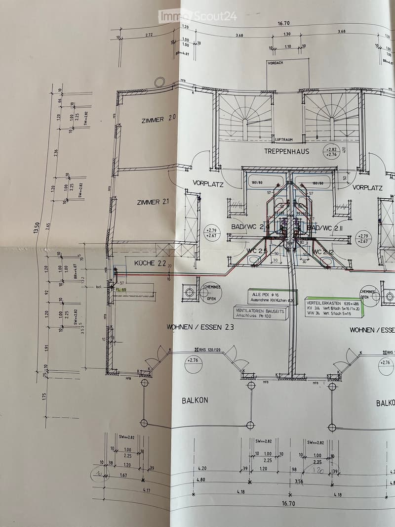 Floor plan showing multiple rooms including living/dining area, kitchen, bedrooms, bathrooms, and a balcony.
