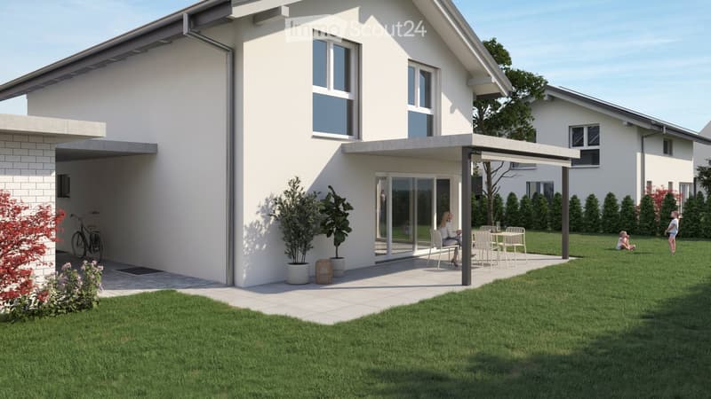 white house with brick ground floor, covered terrace with table and chairs, entrance with bicycle