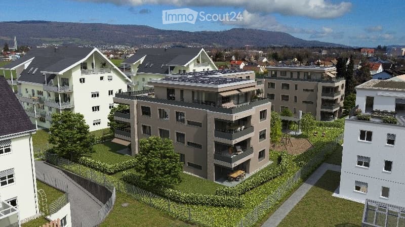 Modern building complex, several buildings, balconies, ground green area, playground