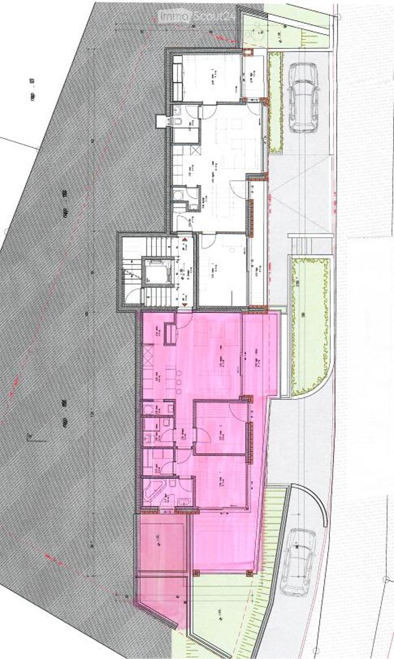 Floor plan of a multi-level building with multiple rooms, including living spaces, bedrooms, bathrooms, and a parking area.