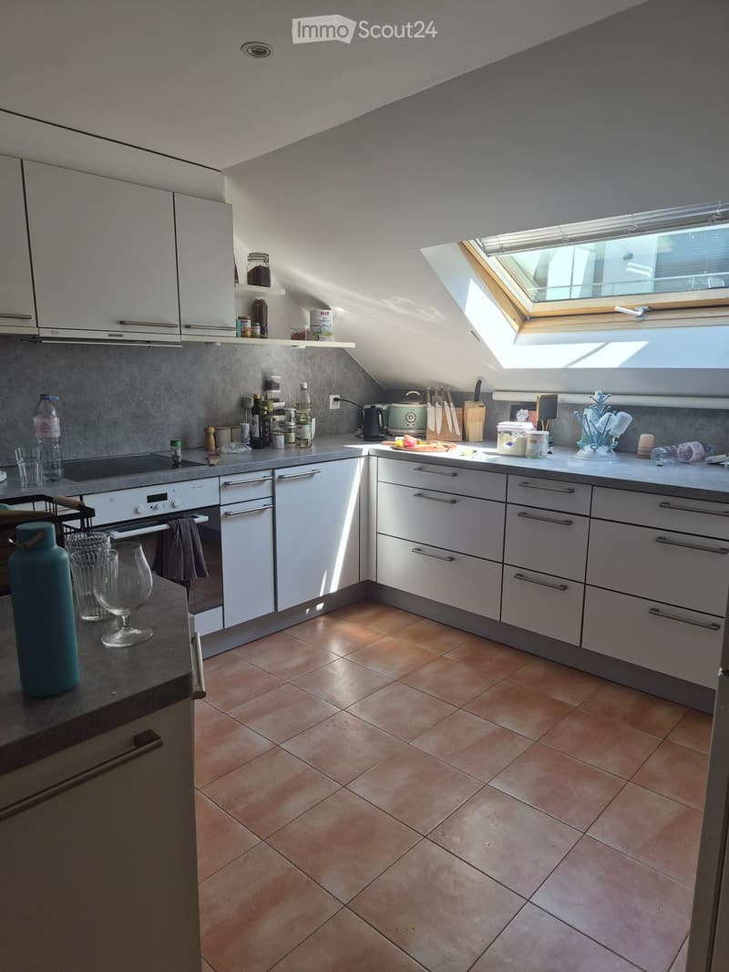 {"type": "Kitchen", "objects": ["oven", "cabinets", "countertop", "bottle", "cup", "wine glass", "knife block", "cutting board", "toaster", "cupboard", "bottle of oil", "bottle of vinegar", "bottle of water", "bottle of juice", "bottle of milk", "bottle o