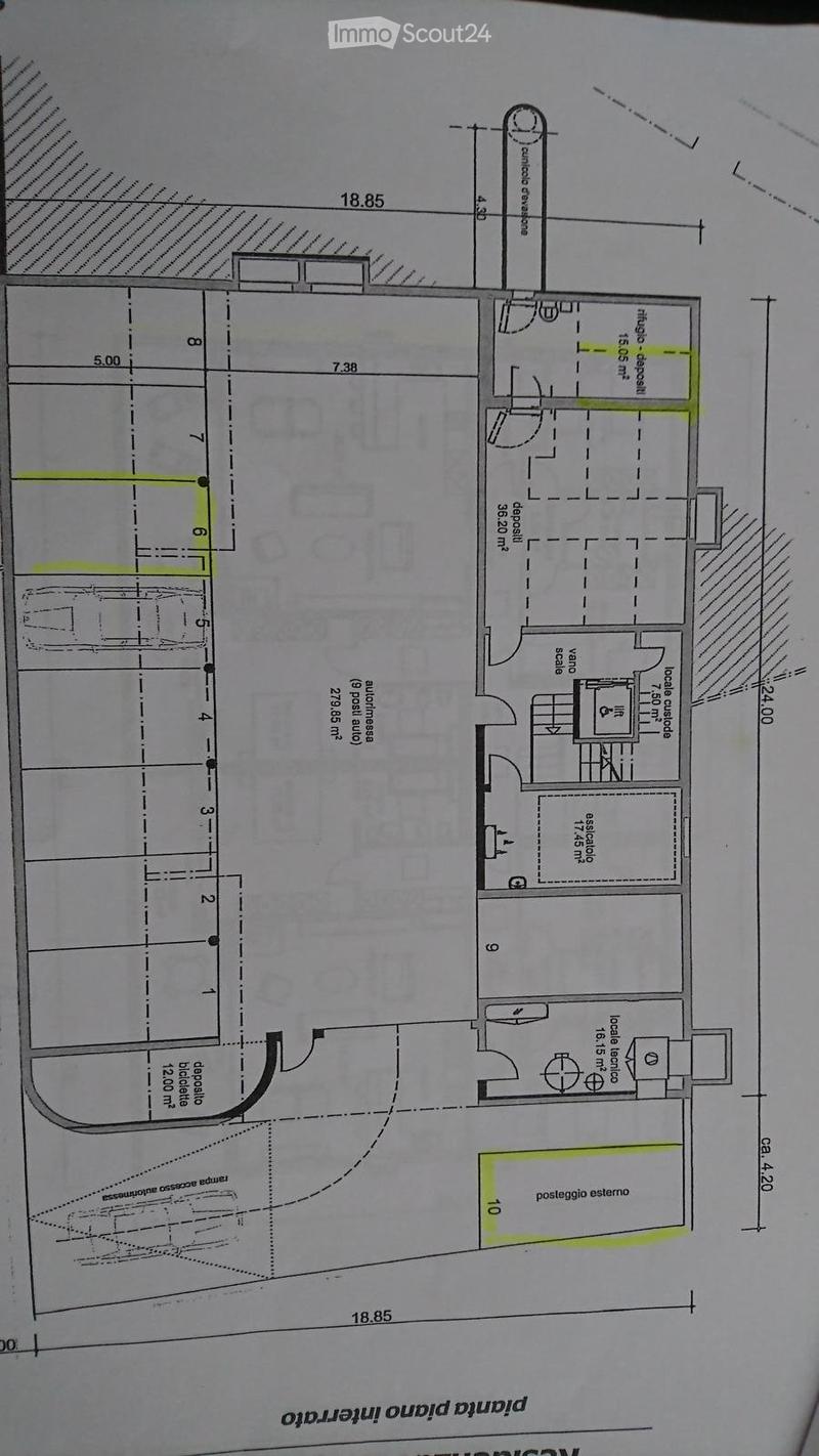 Floor plan of a residential building showing multiple rooms, including a living area, kitchen, bedrooms, bathrooms, and an external patio.