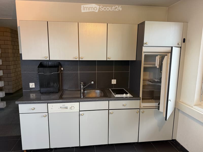 white kitchen with a sink, stove, refrigerator, dishwasher, cabinets