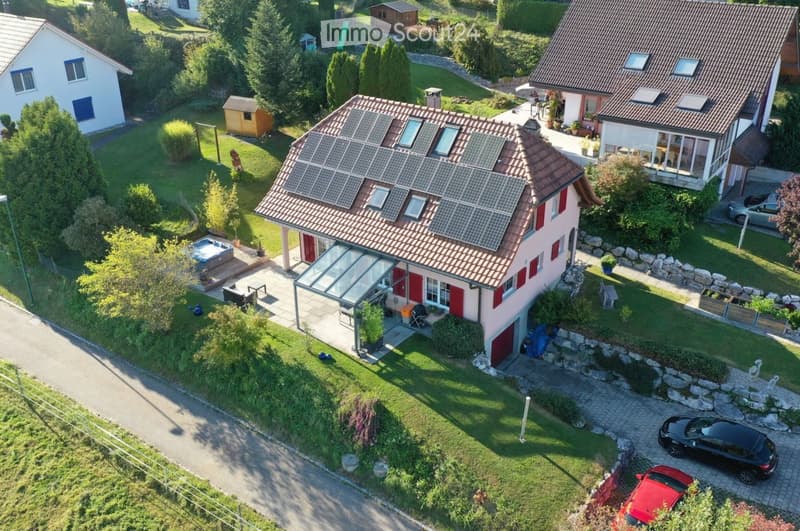 solar panels on the roof, glass conservatory, hot tub, cars parked