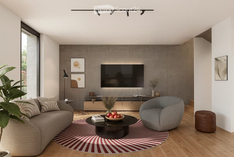 Modern living room with a grey sectional sofa, round coffee table, armchair, TV mounted on a textured wall, and decorative artwork.