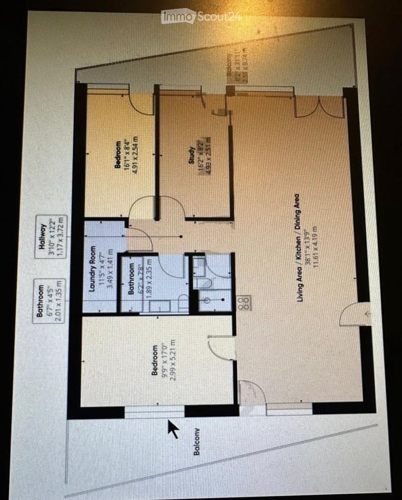 Floor plan showing a layout with a living area, kitchen, dining area, three bedrooms, two bathrooms, a laundry room, a hallway, and a balcony.