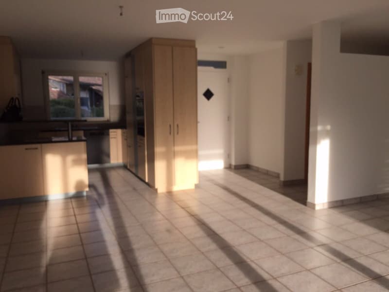 Empty room with tiled floor, white walls, and natural light coming through a window. No furniture or equipment is present.