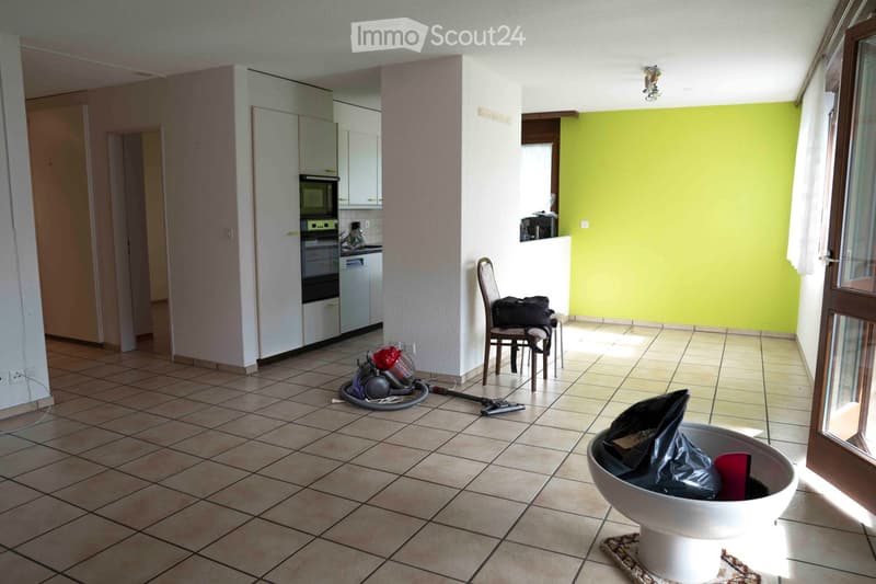 kitchen with appliances including oven, microwave, dishwasher, fridge, chairs, dining table, trash bin