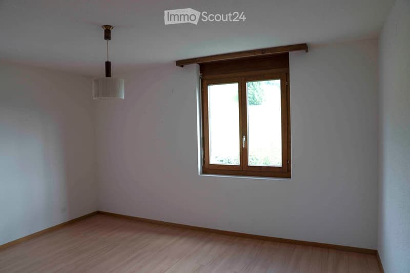 empty room, white walls, wooden floor, window, hanging lamp