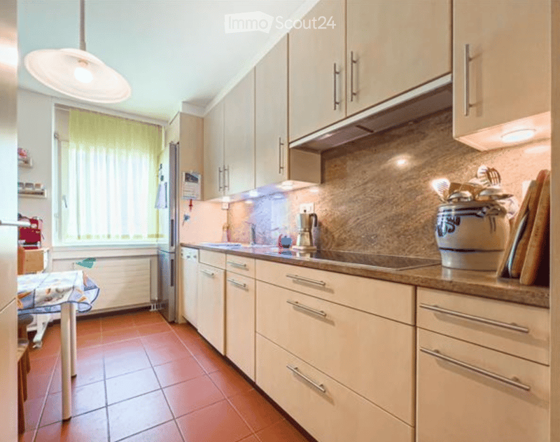 {"type": "Kitchen", "objects": ["cabinets", "countertop", "sink", "faucet", "refrigerator", "table", "cupboard", "cupboard", "cupboard", "cupboard", "cupboard", "cupboard", "cupboard", "cupboard", "cupboard", "cupboard", "cupboard", "cupboard", "cupboard"