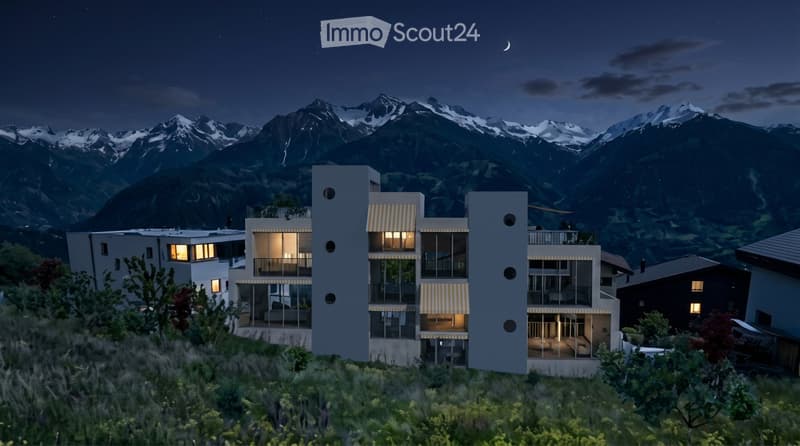 Modern multi-story building with large windows and balconies, set against a backdrop of snow-capped mountains at night.