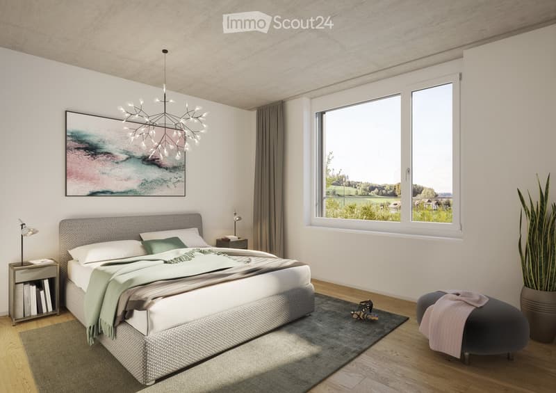 Modern bedroom with a large bed, nightstand, chandelier, ottoman, potted plant, and scenic view through large windows.