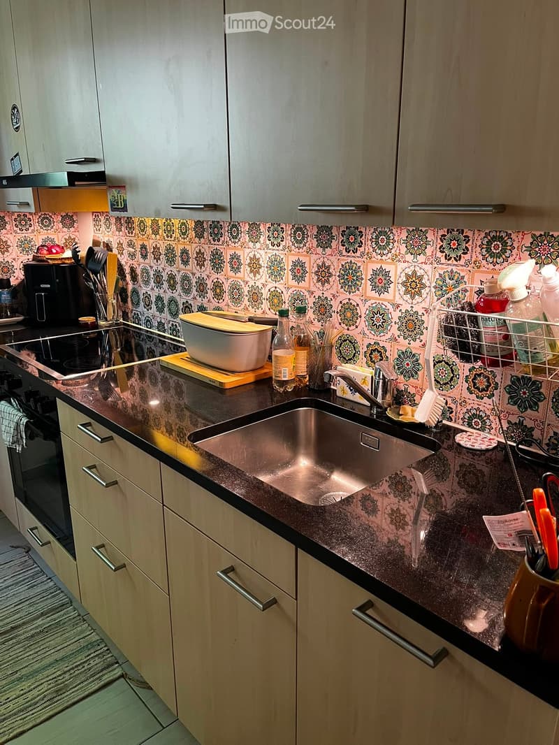 {"type": "Kitchen", "objects": ["sink", "faucet", "oven", "coffee maker", "toaster", "cutting board", "bowl", "bottle", "cup", "faucet", "faucet", "faucet", "faucet", "faucet", "faucet", "faucet", "faucet", "faucet", "faucet", "faucet", "faucet", "faucet"