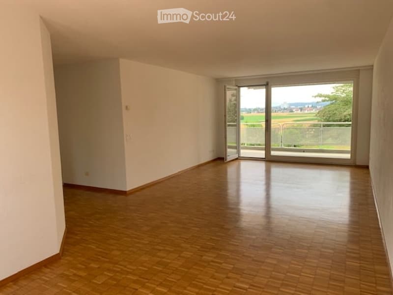 Empty room, sliding doors, balcony, tiled flooring, scenic view