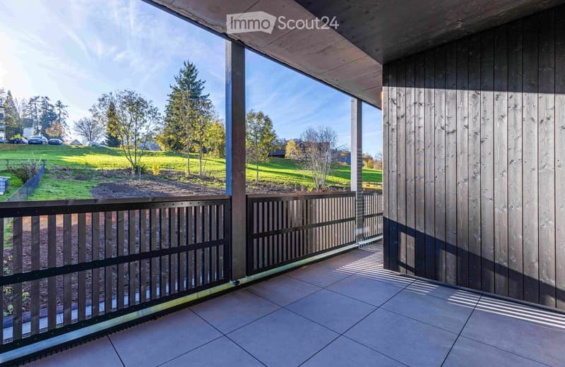 covered balcony, wooden railings, stone floor, beautiful landscape view