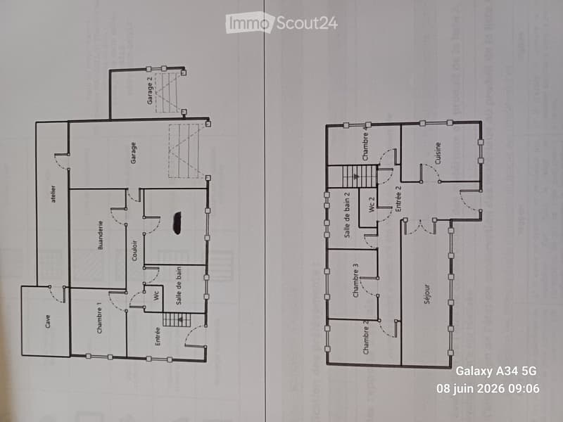 Floor plan of a two-story house with multiple rooms including living room, bedrooms, bathrooms, garage, and entrance.