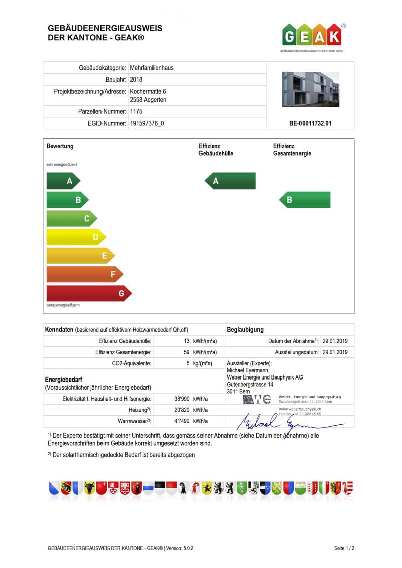 Official energy certificate for a multi-family house built in 2018, located at Kochermatte 6, 2558 Aegerten. The certificate includes efficiency ratings, energy consumption data, and a small image of the building.