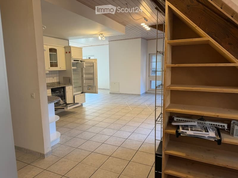 empty room, tiled floor, open kitchen, refrigerator, dishwasher, wooden staircase