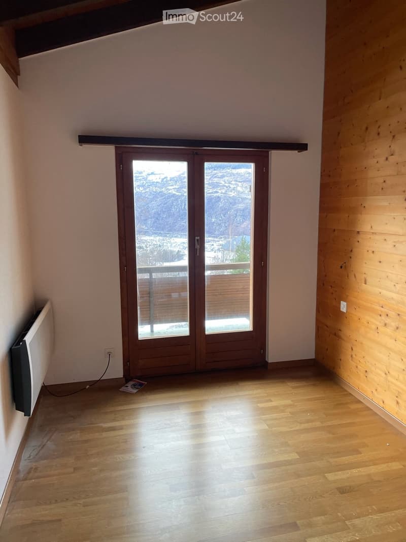 empty room, wooden floor, white walls, wooden wall, balcony, sliding glass doors, power outlet, heater