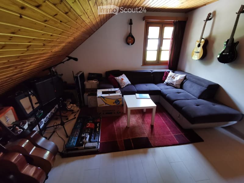 {"type": "Furnished Room", "objects": ["sofa", "coffee table", "guitar", "guitar", "guitar", "guitar", "guitar", "guitar", "guitar", "guitar", "guitar", "guitar", "guitar", "guitar", "guitar", "guitar", "guitar", "guitar", "guitar", "guitar", "guitar", "g