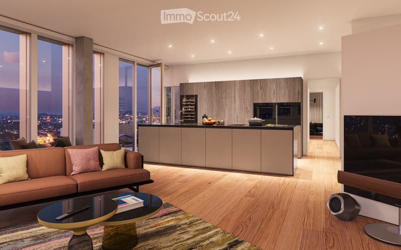 Modern living room with a brown leather sofa, coffee table, kitchen island, and large windows offering a cityscape view.