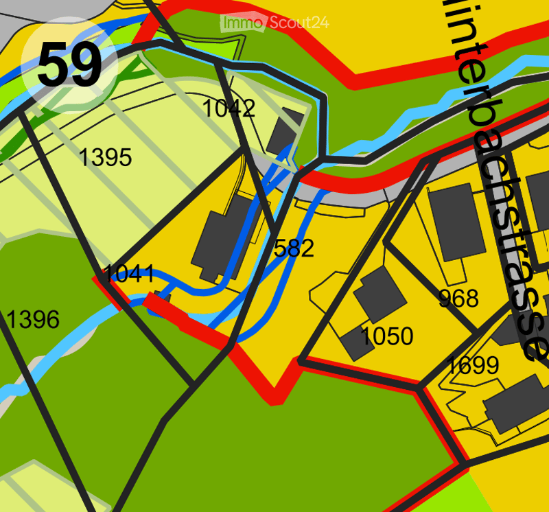 Topographic map showing various land plots with different colors and numerical labels, indicating property boundaries and elevation.