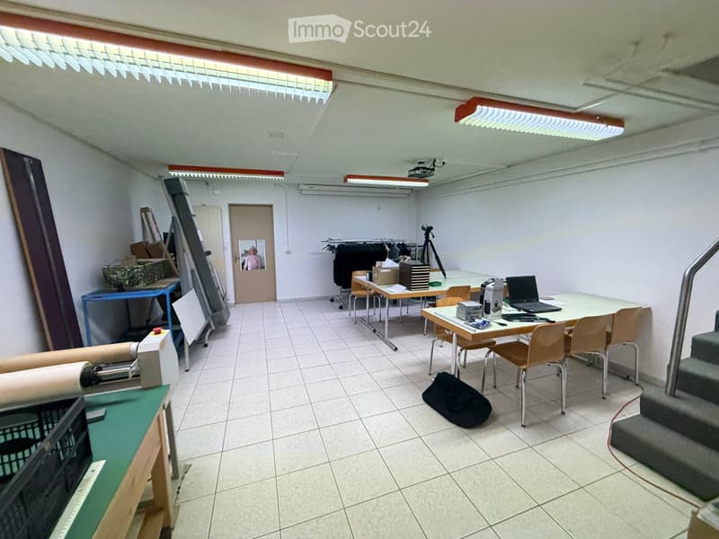 {"type": "Furnished Room", "objects": ["table", "chair", "laptop", "tripod", "clothing rack", "stool", "stool", "stool", "stool", "stool", "stool", "stool", "stool", "stool", "stool", "stool", "stool", "stool", "stool", "stool", "stool", "stool", "stool",