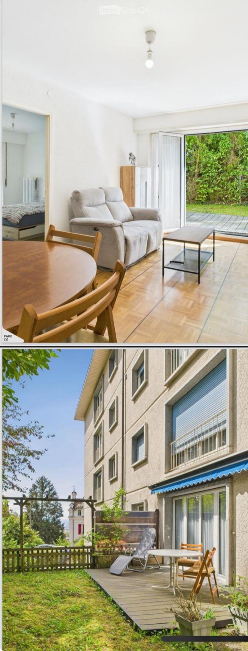 The image shows a modern, well-furnished living space with a sofa, dining table, and chairs. The room features large windows with a view of greenery outside, and the flooring is light wood. There is also a small table and chairs near the window, suggestin