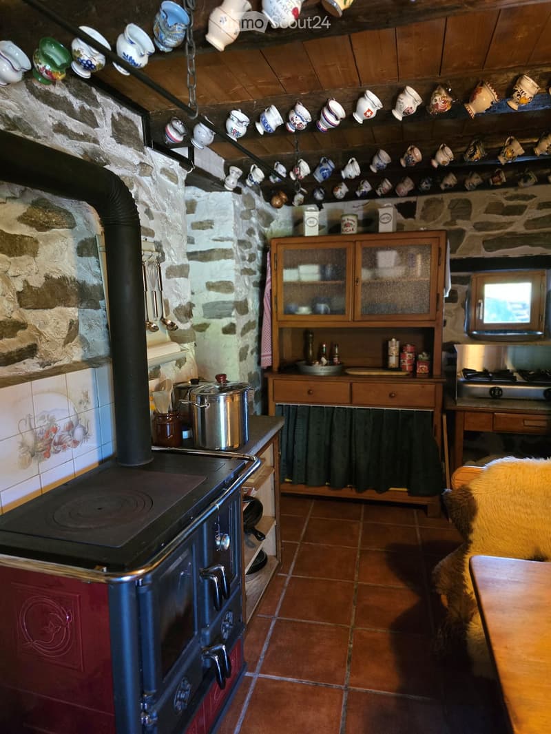 {"type": "Kitchen", "objects": ["stove", "oven", "cupboard", "table", "cup", "pot", "faucet", "bottle", "cupboard", "cupboard", "cupboard", "cupboard", "cupboard", "cupboard", "cupboard", "cupboard", "cupboard", "cupboard", "cupboard", "cupboard", "cupboa
