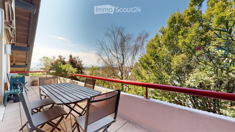 Terrace with table and chairs, potted plants, elevated position with distant view