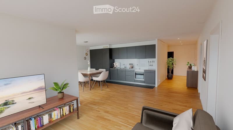 Open kitchen with dining table, TV, bookshelf with books, gray furniture, plants