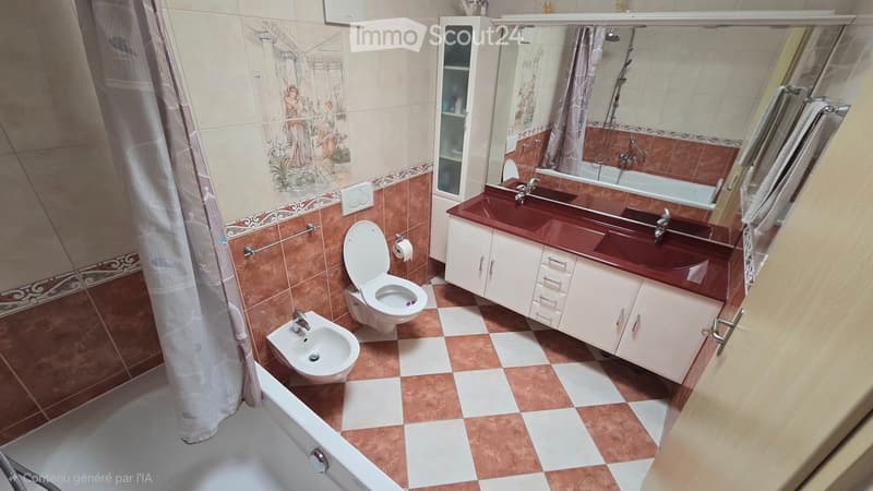 Bathroom with a toilet, bidet, bathtub, double sink, mirror, and cabinet. The walls are tiled with a decorative border, and the floor has a checkered tile pattern.