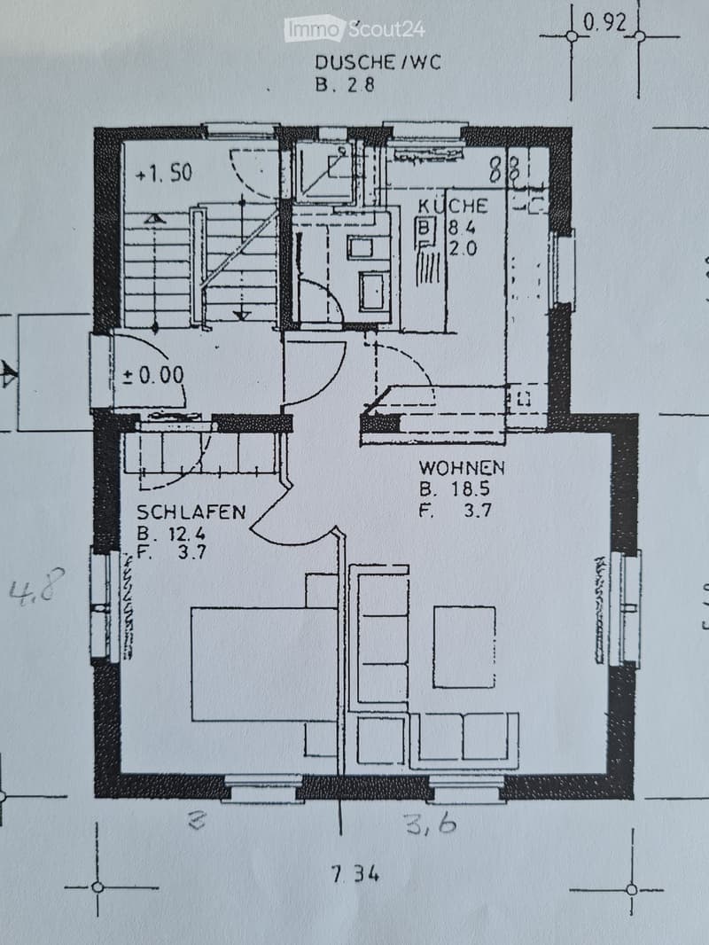 Floor plan showing a kitchen, living area, bedroom, and bathroom with dimensions and labels in German.