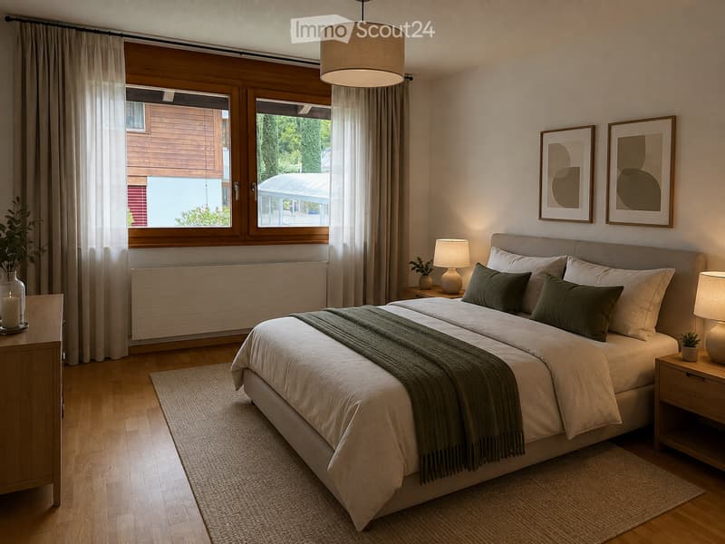Modern bedroom with a large bed, nightstands, lamps, artwork, and a view of greenery outside.