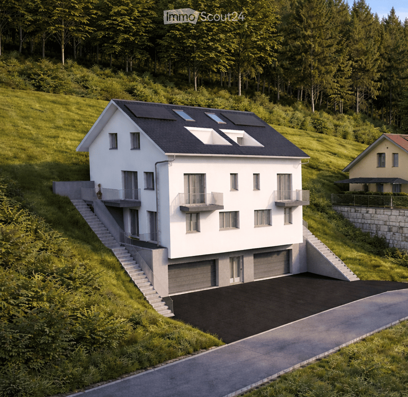 Modern two-story house with white exterior, multiple balconies, and a garage. The house is situated on a raised ground floor with a driveway and parking area.