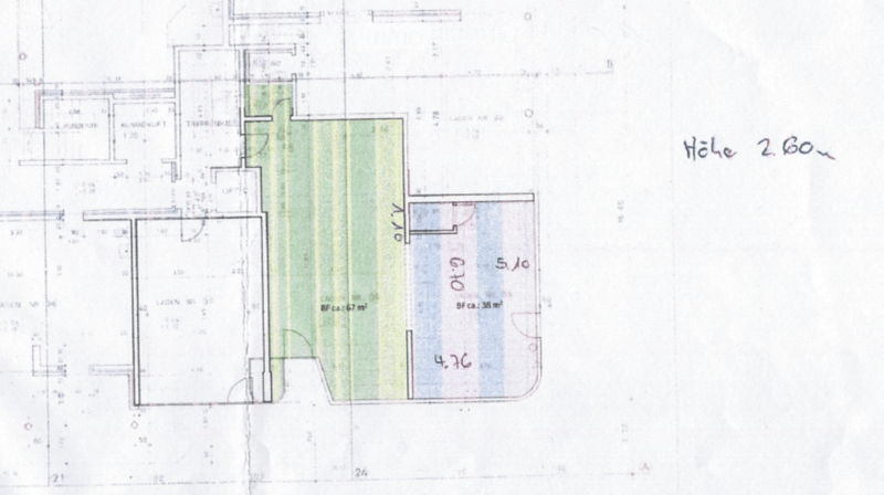 Floor plan showing a layout with labeled areas including a living room, kitchen, and bedrooms. Dimensions and room labels are visible.