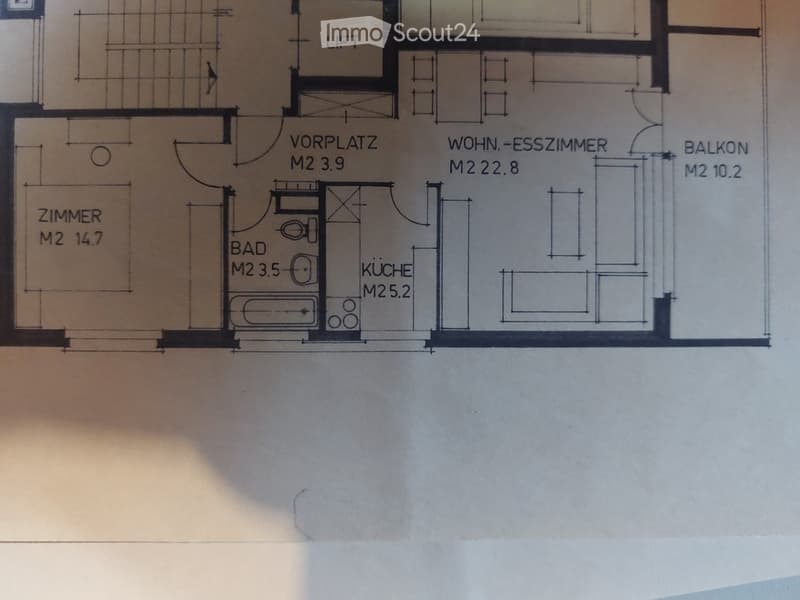 Floor plan showing a room layout with a living-dining room, kitchen, bathroom, bedroom, entrance area, and balcony.