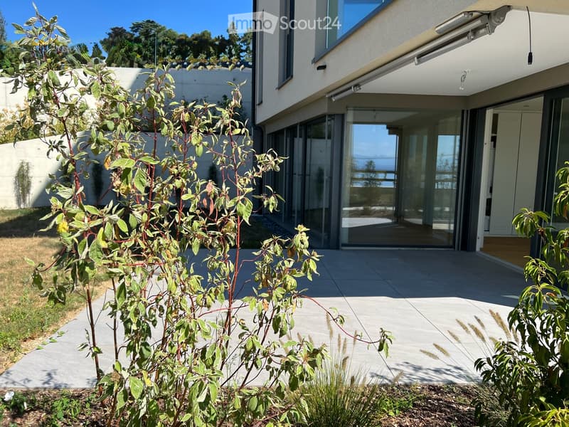 Appartamento nuovo di 2.5 locali con terrazza e prato privato, bella vista sul lago e le montagne (6)
