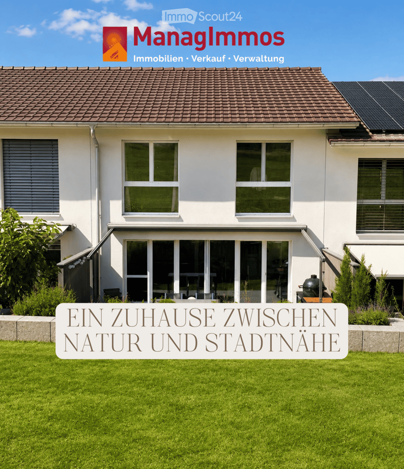 Two-story house with white exterior, brown tiled roof, multiple windows, solar panels on the roof, and a well-maintained lawn in front.