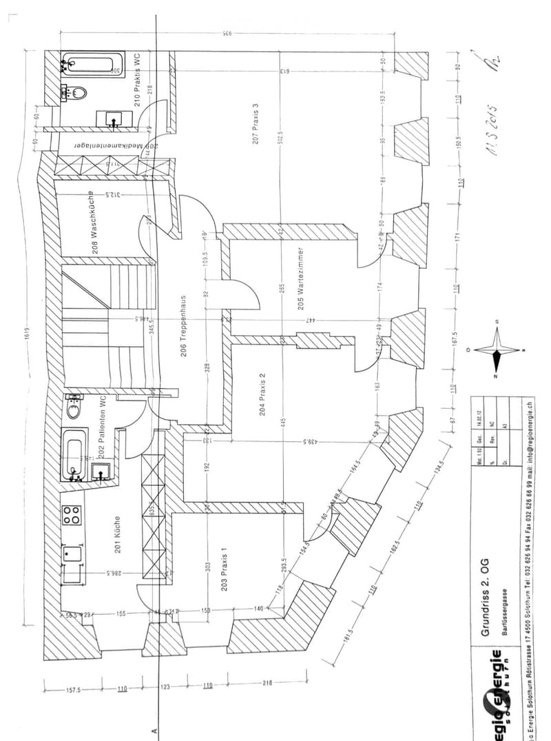 Floor plan of a medical facility showing multiple rooms including kitchen, patient rooms, practice rooms, washroom, and waiting area.