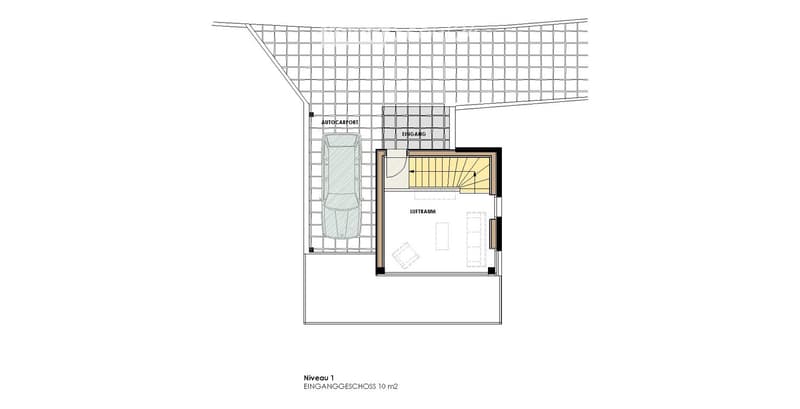 Floor plan of a building's first level showing an entrance hall, living space, and a carport.